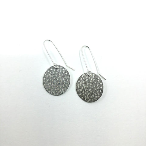 Holey disc earrings Shiney Sterling